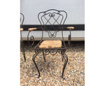 Paire de fauteuils années 40 en métal et paille