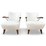 A pair of vintage mid-century Beech wood Boucle wool fabric lounge chairs France